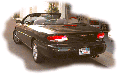 [Rear corner view with top down]